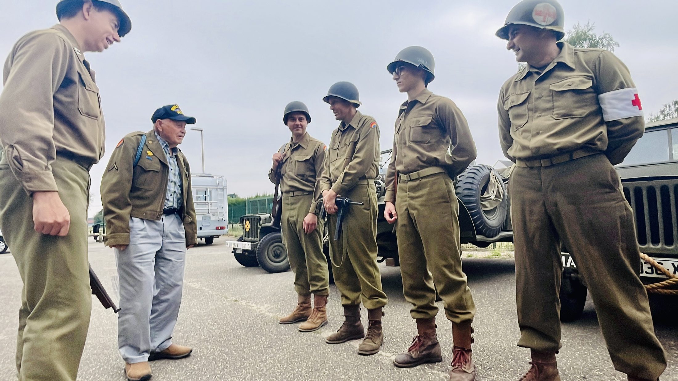 Bud Gahs, 42nd Rainbow Division veteran, with re-enactors in Alsace